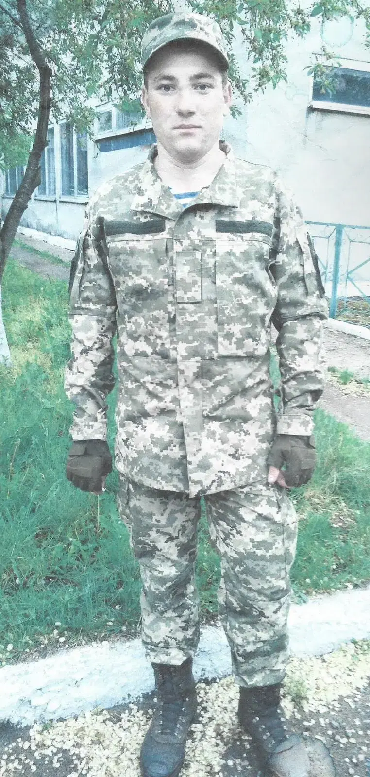 Original photo of a serviceman before retouching